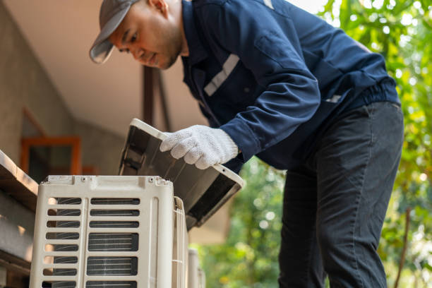 Technician reviewing ac repair diagnostics