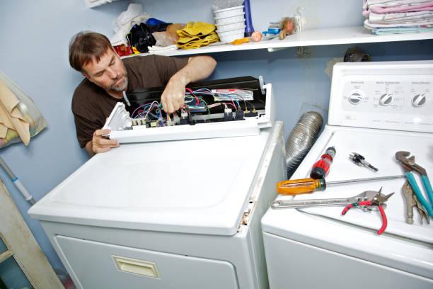 Technician performing a dryer diagnostic