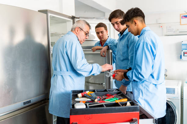 Fridge repair technician working