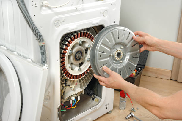 Technician performing a washer diagnostic
