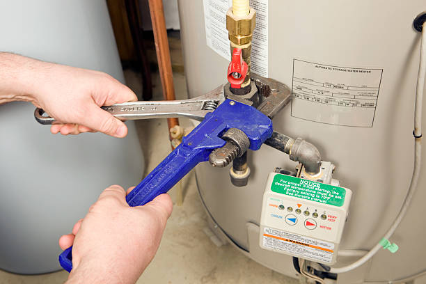Water Heater repair technician working